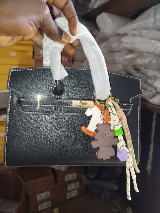 Black Textured Leather Top Handle Bag with Gold Hardware and Charms