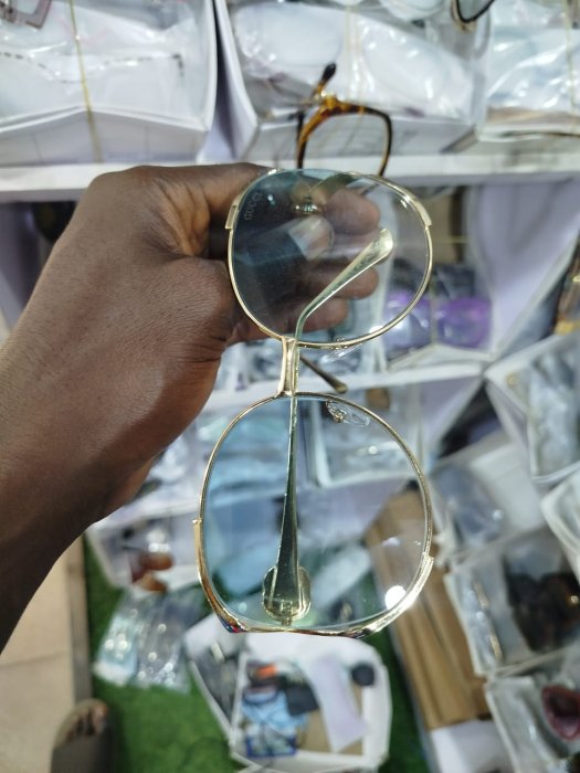 Gucci Oversized Round Gold-Tone Sunglasses with Light Blue Gradient Lenses[cite: 14]