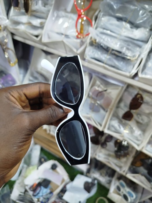 Geometric Black and White Cat-Eye Sunglasses with Dark Lenses
