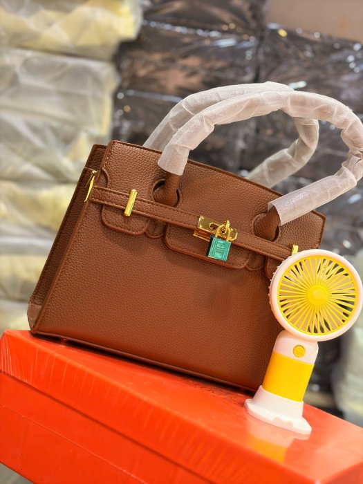 Classic Textured Leather Lock Top-Handle Hermes Bag