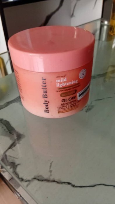 Clin-tone Mild Lightening Body Butter GLOW Bath Scrub - Coconut & Vanilla[cite: 13]